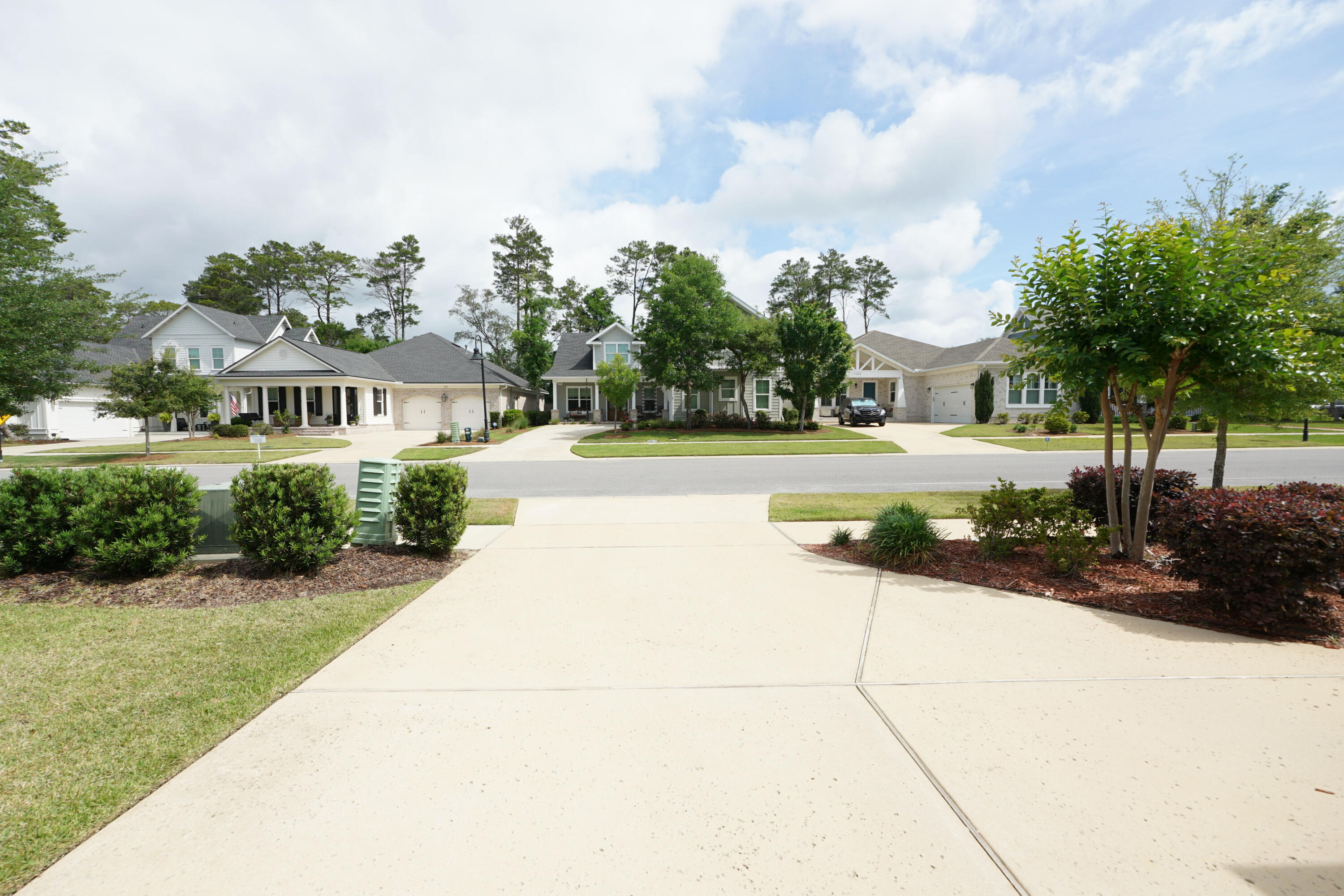 1144 Deer Moss Loop Niceville, FL 32578 - Photo 49 of 55 1144DeerMossFrtPorch4Yrd - Copy