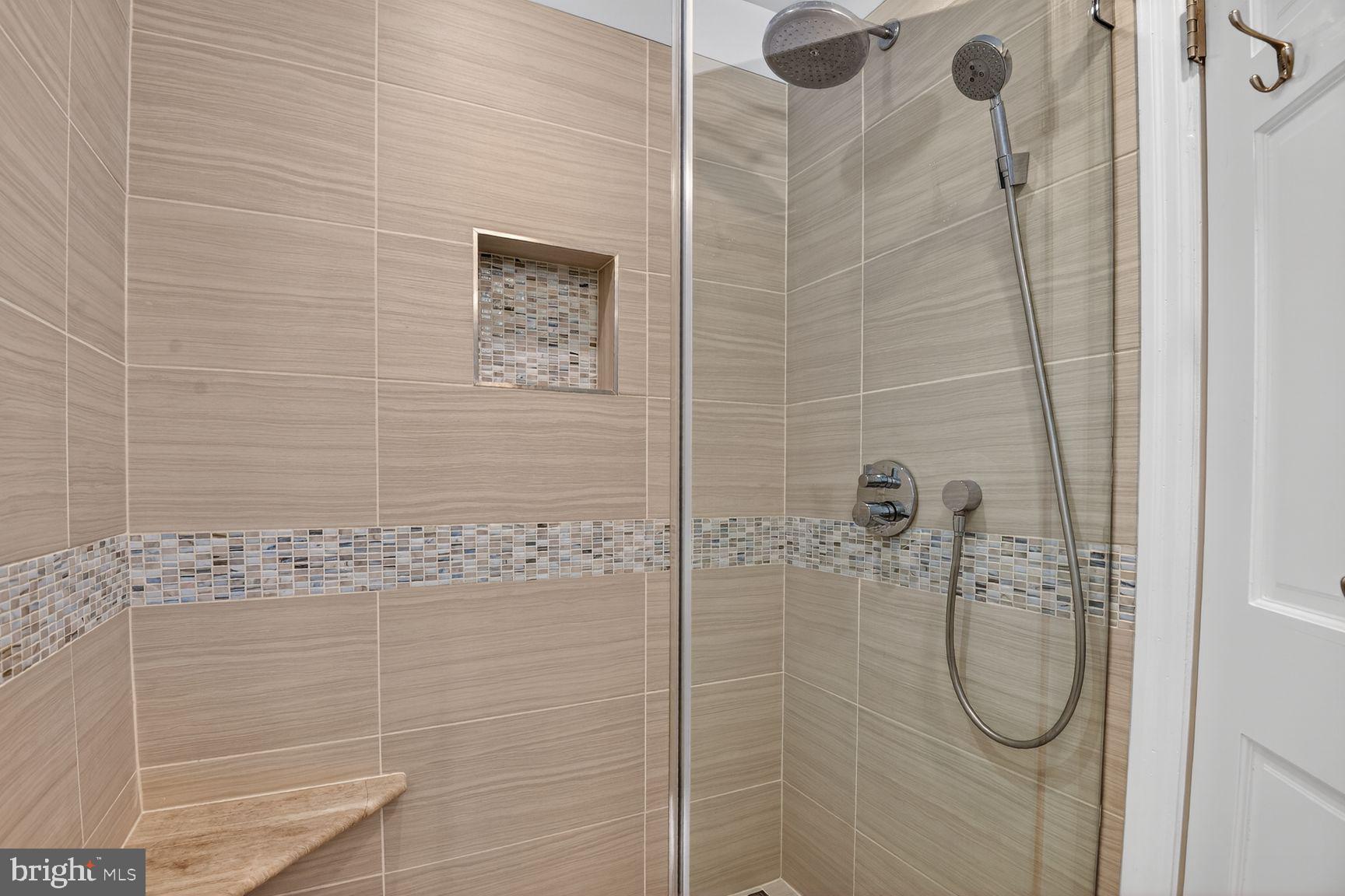 5225 Elliott Road Bethesda, MD 20816 - Photo 23 of 37 a bathroom with a shower
