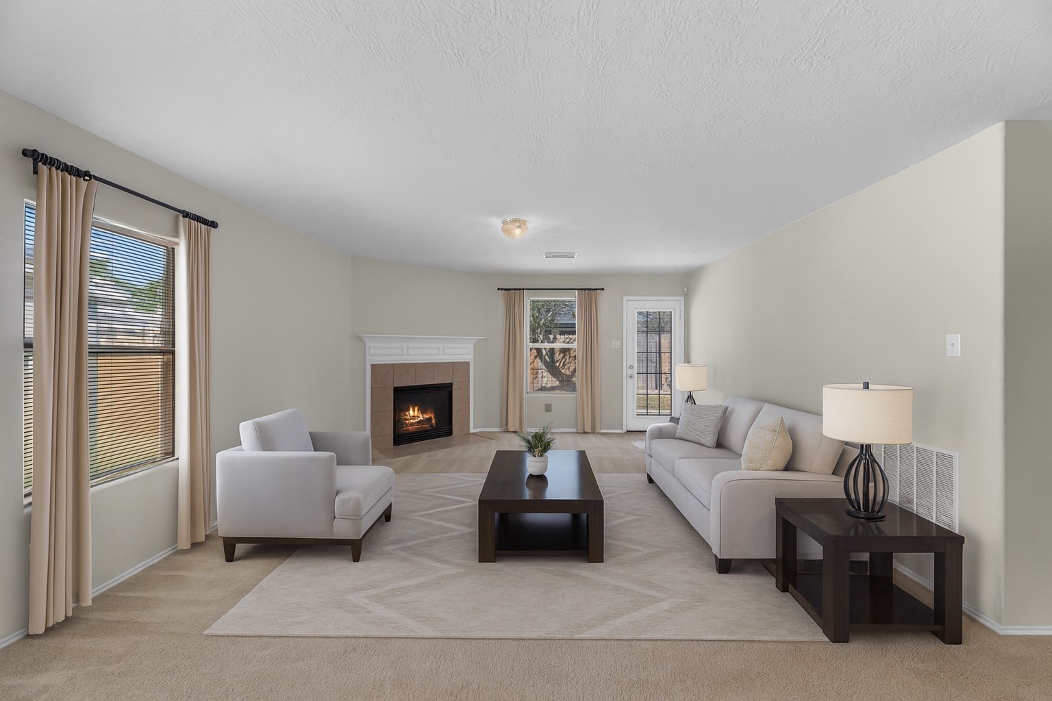 16810 Perryton Lane Houston, TX 77073 - Photo 3 of 26 Living area featuring a gas fireplace
*Photo has been digitally staged
*Photo has been digitally staged