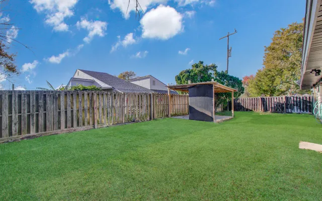 a view of a backyard with a garden