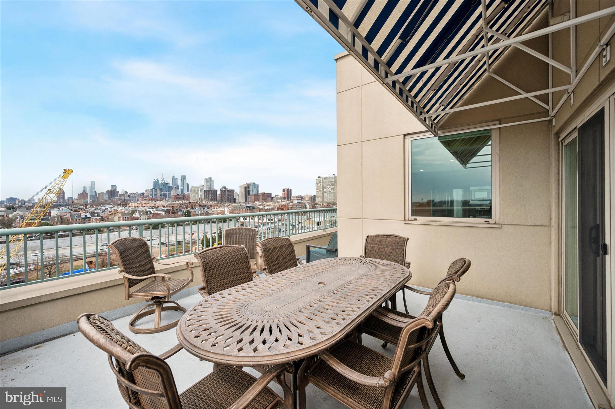 717 South Christopher Columbus Boulevard, Unit 802 Philadelphia, PA 19147 - Photo 25 of 32 a view of a chairs and table in patio