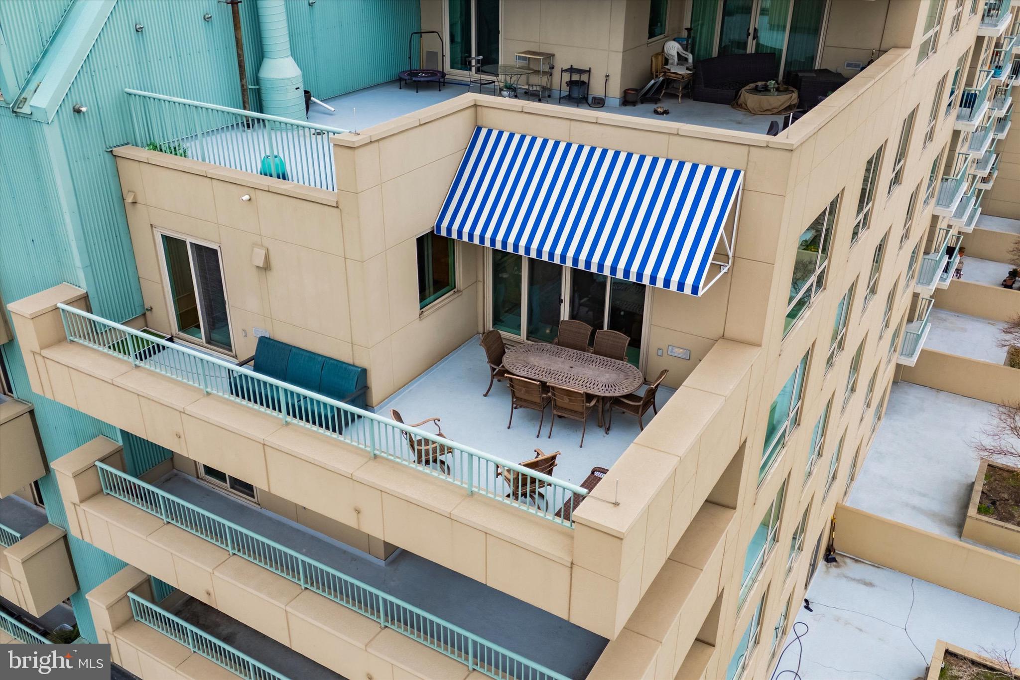 717 South Christopher Columbus Boulevard, Unit 802 Philadelphia, PA 19147 - Photo 26 of 32 a view of a balcony with furniture