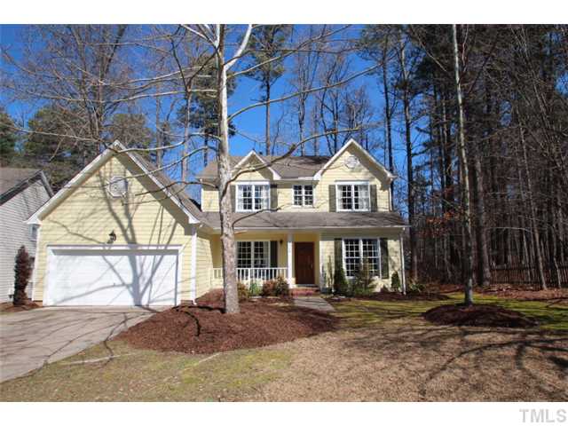 12108 North Exeter Way Raleigh, NC 27613 - Photo 1 of 19 a front view of a house with garden