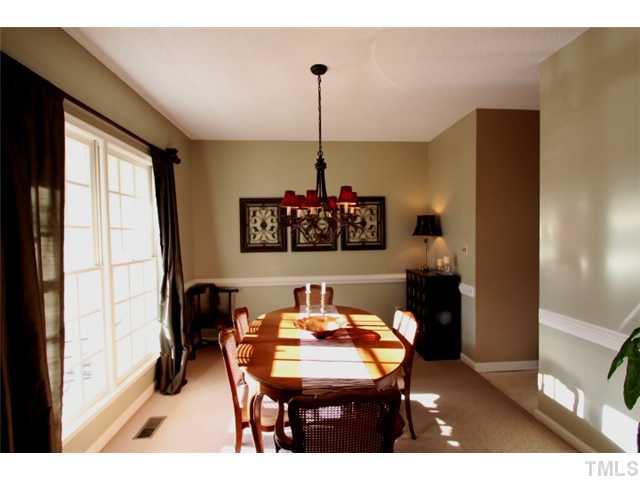 12108 North Exeter Way Raleigh, NC 27613 - Photo 6 of 19 a dining room with furniture and window