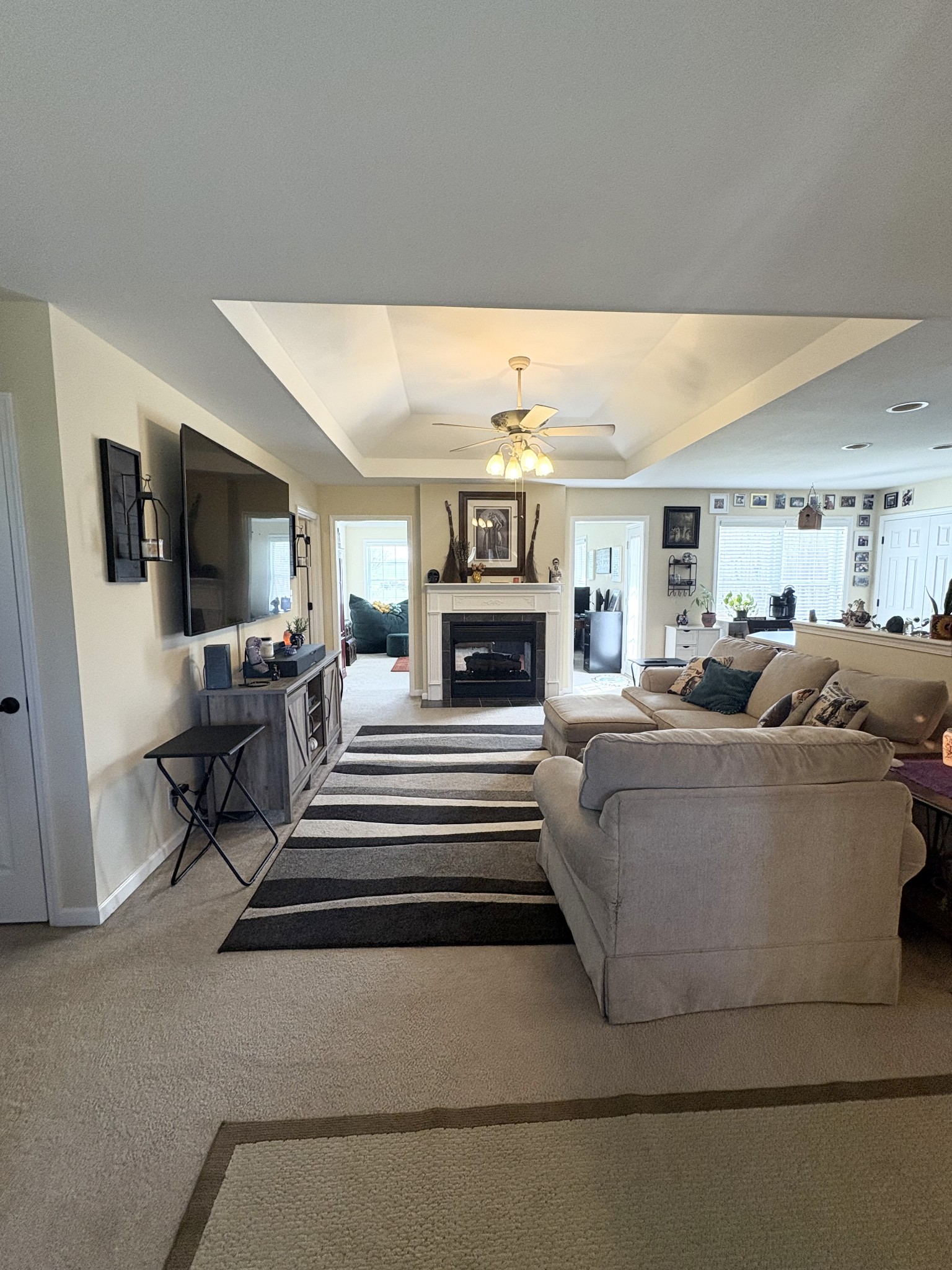 3851 Springdale Road Cunningham, TN 37052 - Photo 2 of 33 a living room with furniture and a fireplace