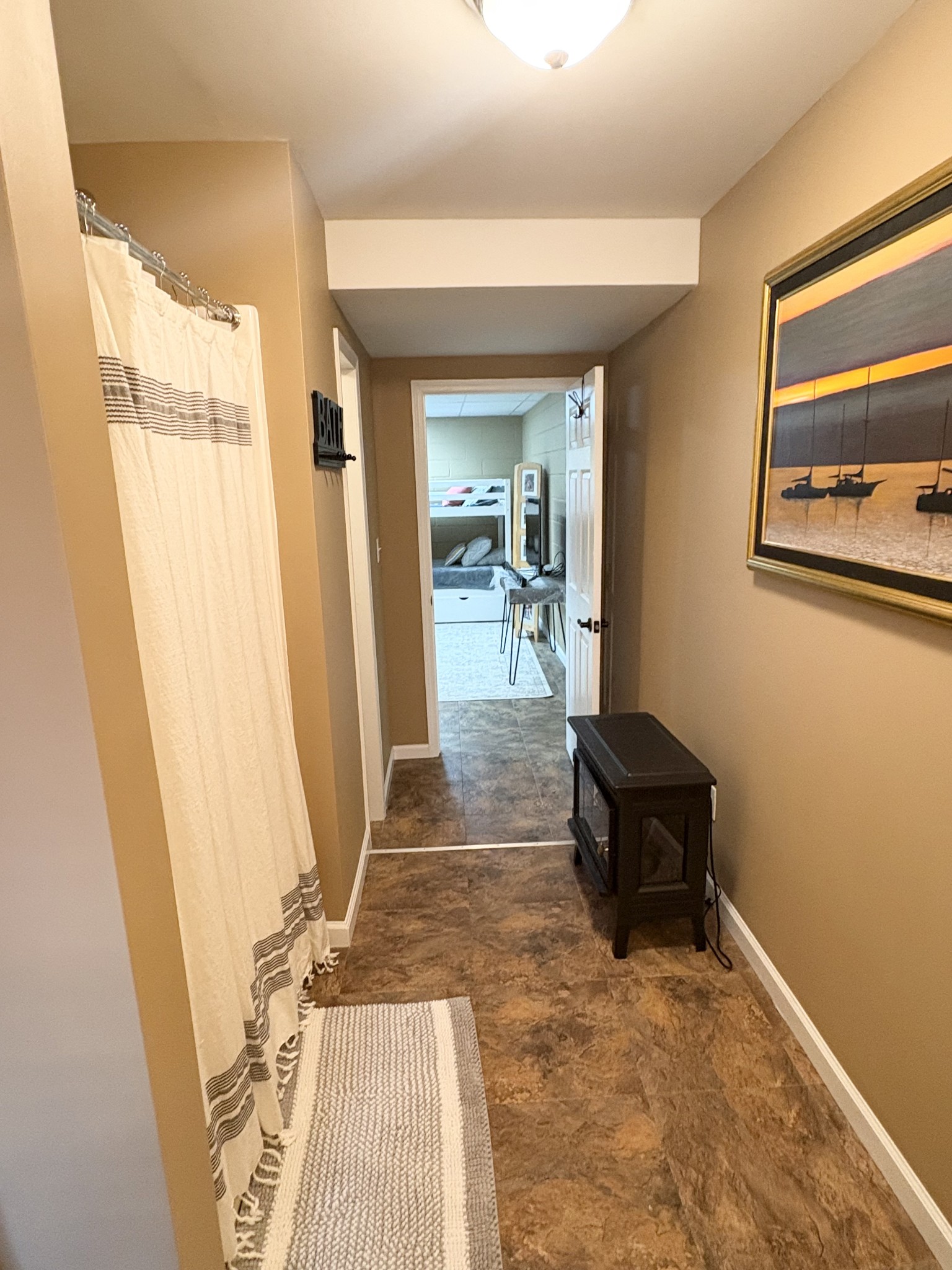 3851 Springdale Road Cunningham, TN 37052 - Photo 21 of 33 a living room with a couch and a table