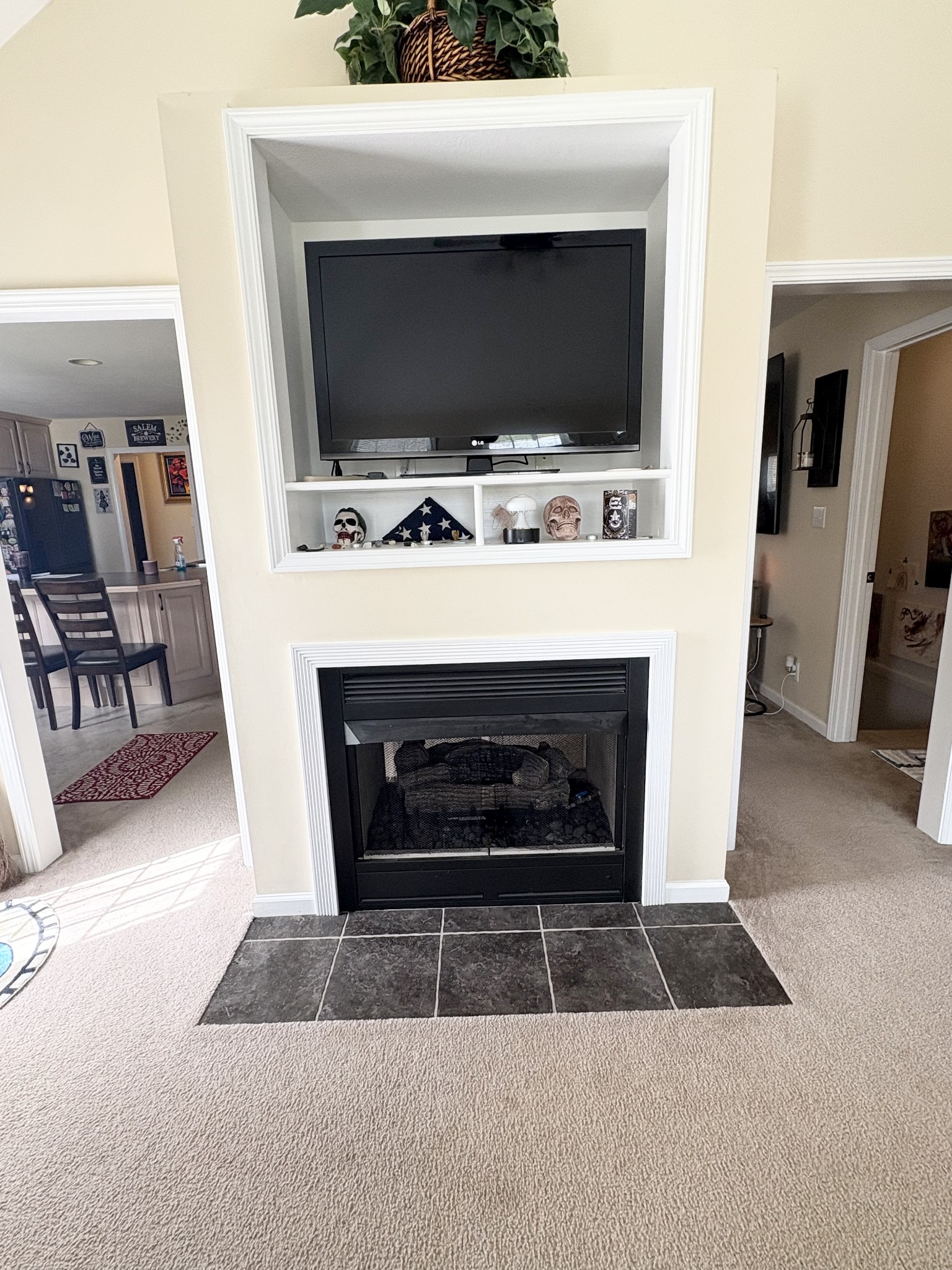 3851 Springdale Road Cunningham, TN 37052 - Photo 5 of 33 a living room with furniture a flat screen tv and a fireplace