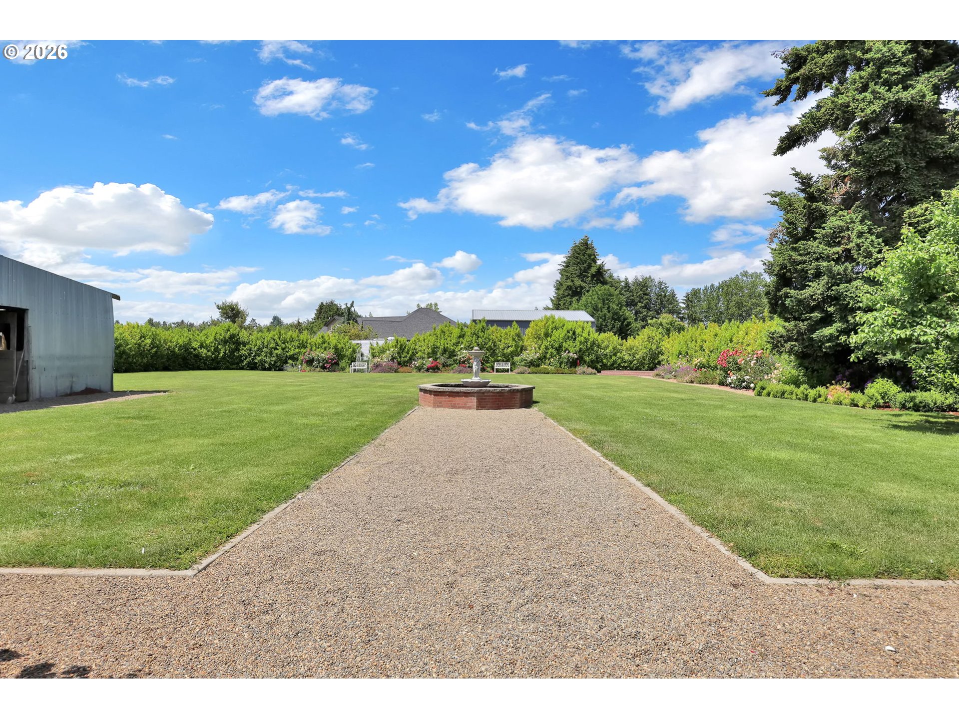 90440 Goodman Road Junction City, OR 97448 - Photo 38 of 48 a view of a garden with an trees