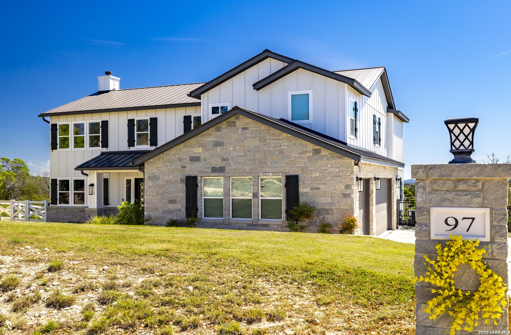 97 Coleman Springs Boerne, TX 78006 - Photo 1 of 70 a front view of a house with large garden