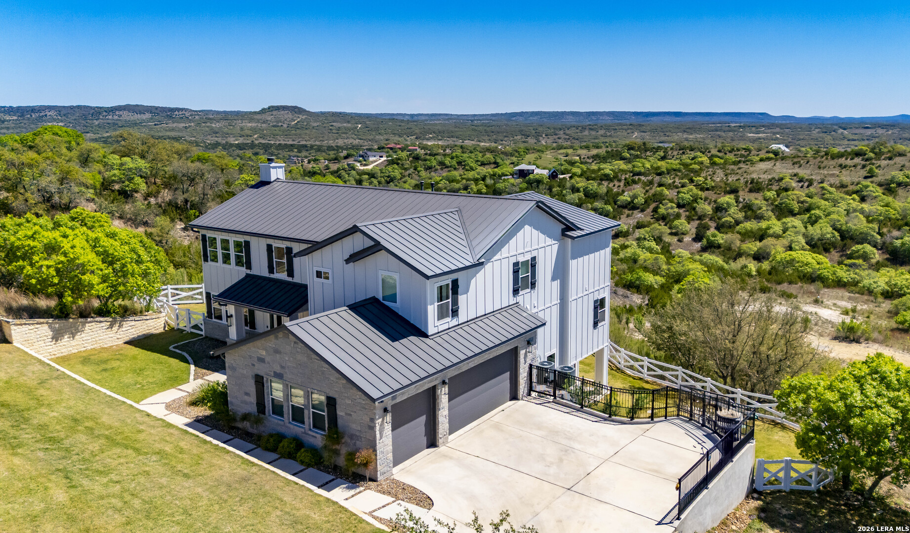 97 Coleman Springs Boerne, TX 78006 - Photo 11 of 70 an aerial view of a house with a garden