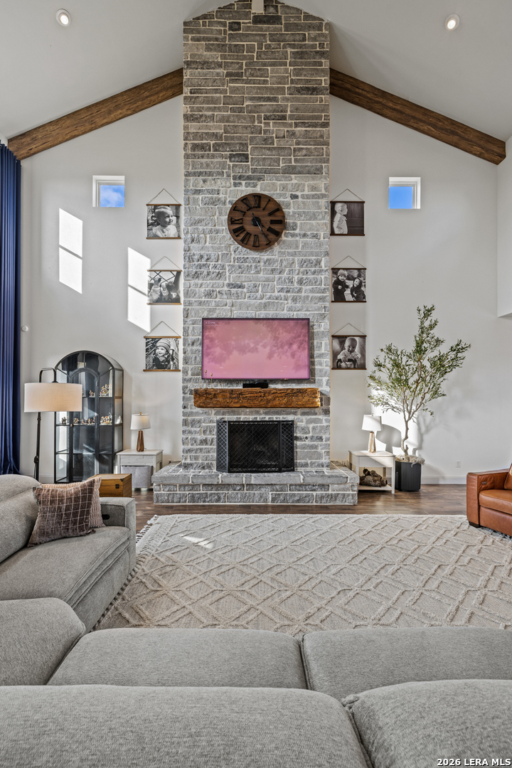 97 Coleman Springs Boerne, TX 78006 - Photo 21 of 86 a living room with furniture and a fireplace