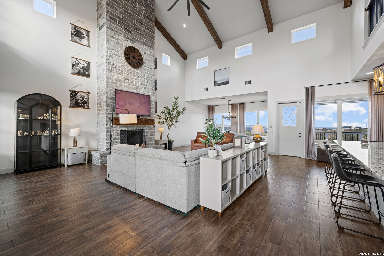 97 Coleman Springs Boerne, TX 78006 - Photo 26 of 86 a living room with furniture and a fireplace