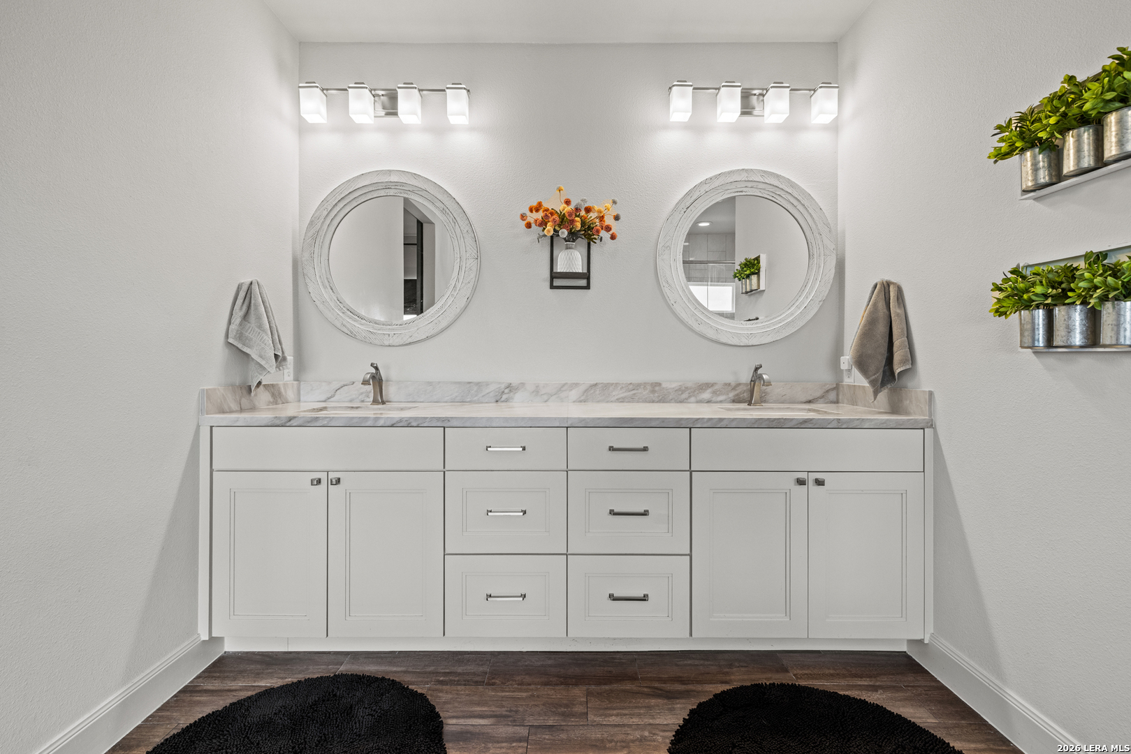 97 Coleman Springs Boerne, TX 78006 - Photo 43 of 86 a bathroom with a granite countertop double vanity sink and a mirror