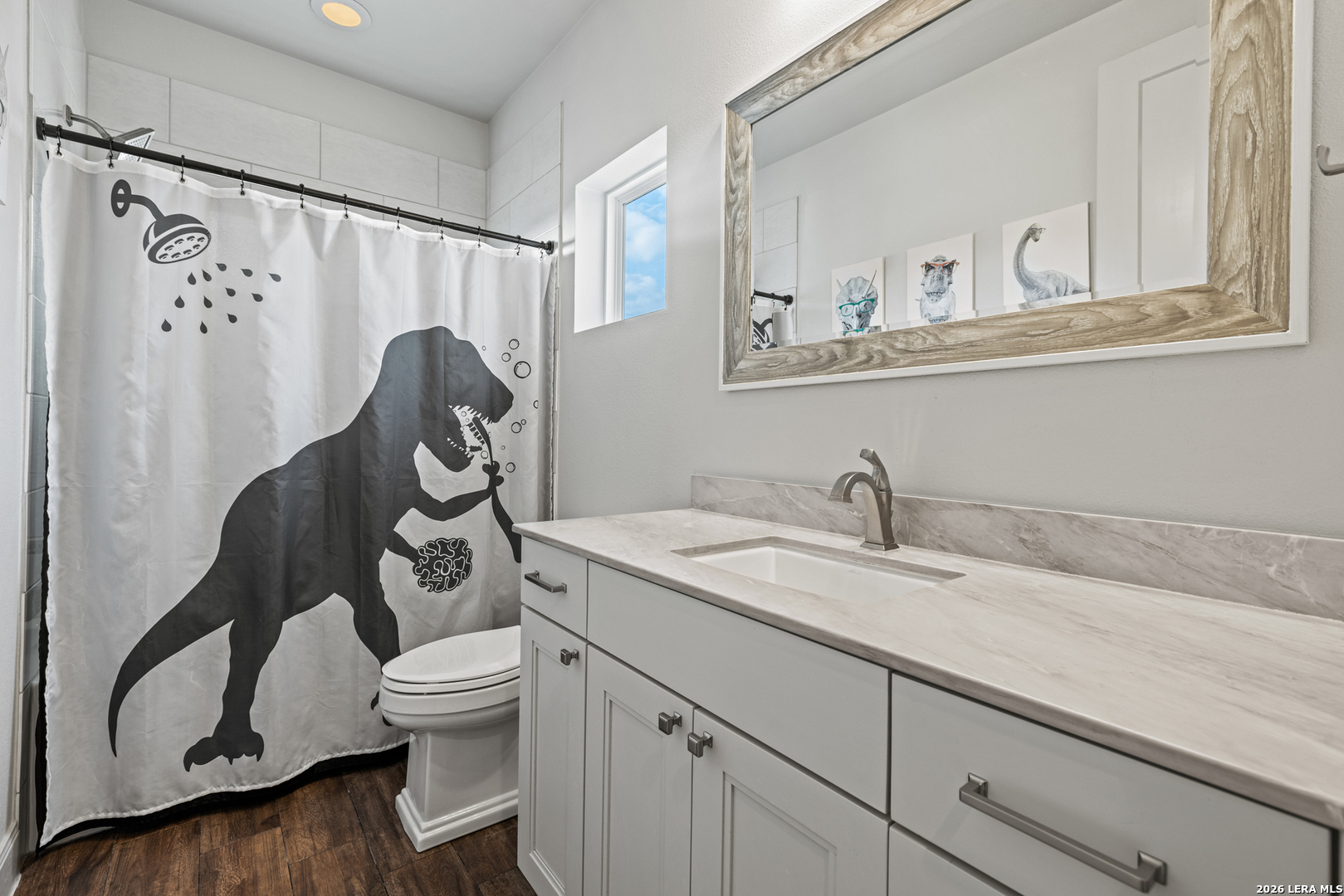 97 Coleman Springs Boerne, TX 78006 - Photo 51 of 86 a bathroom with a granite countertop sink mirror vanity and toilet