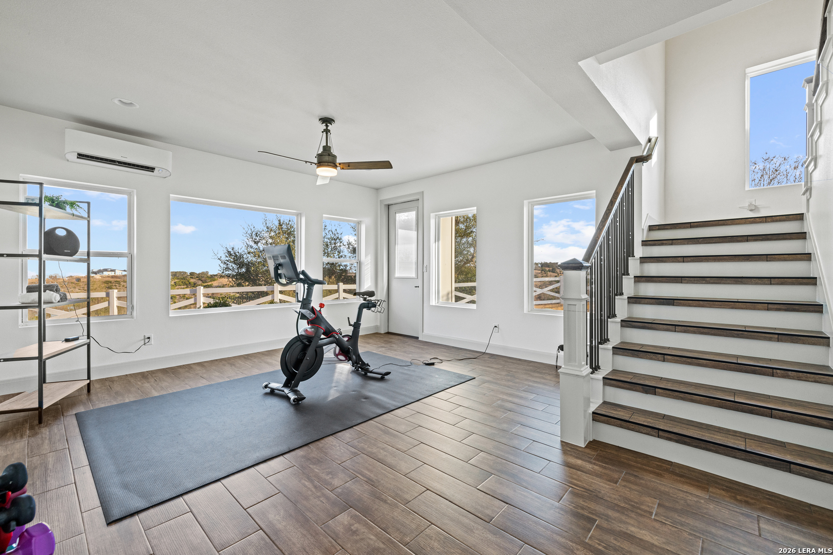 97 Coleman Springs Boerne, TX 78006 - Photo 54 of 86 a view of a room with wooden floor stairs and windows