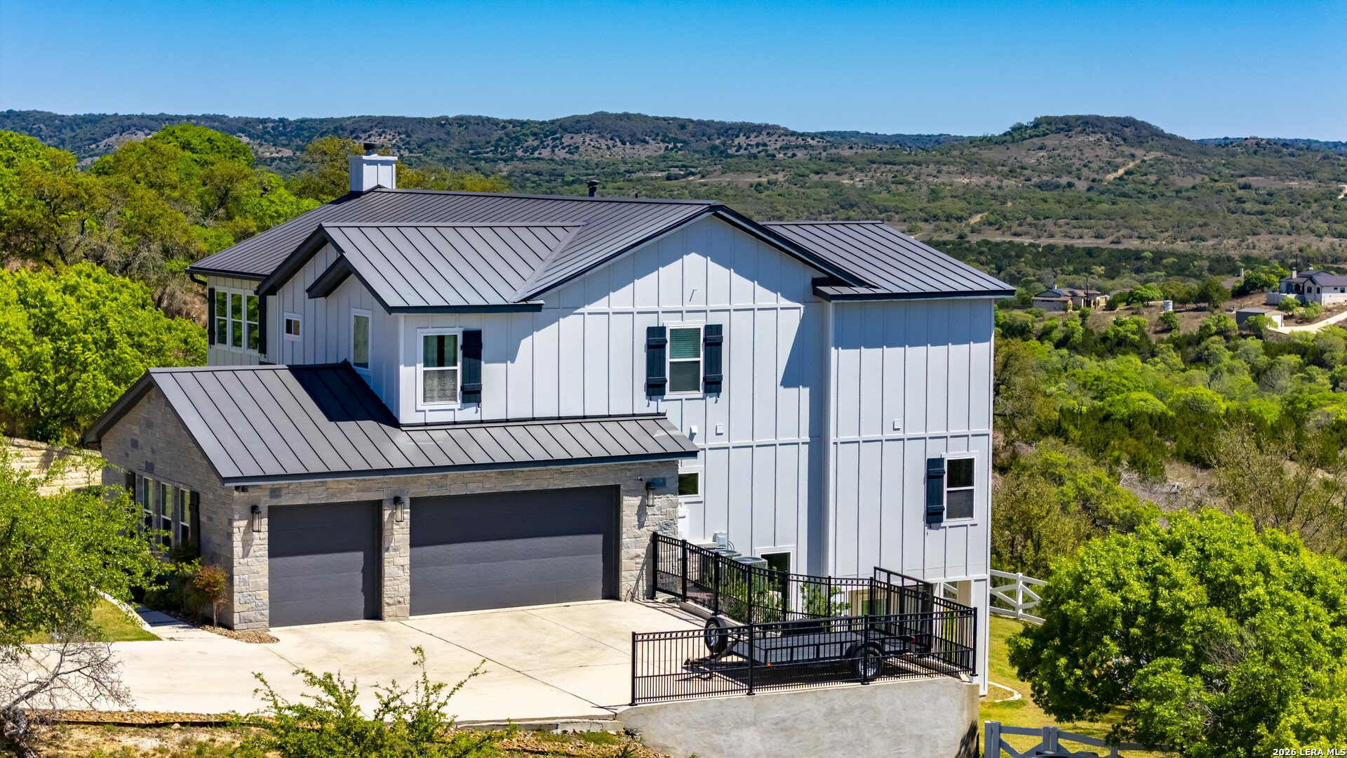 97 Coleman Springs Boerne, TX 78006 - Photo 7 of 70 a front view of a house with a garden