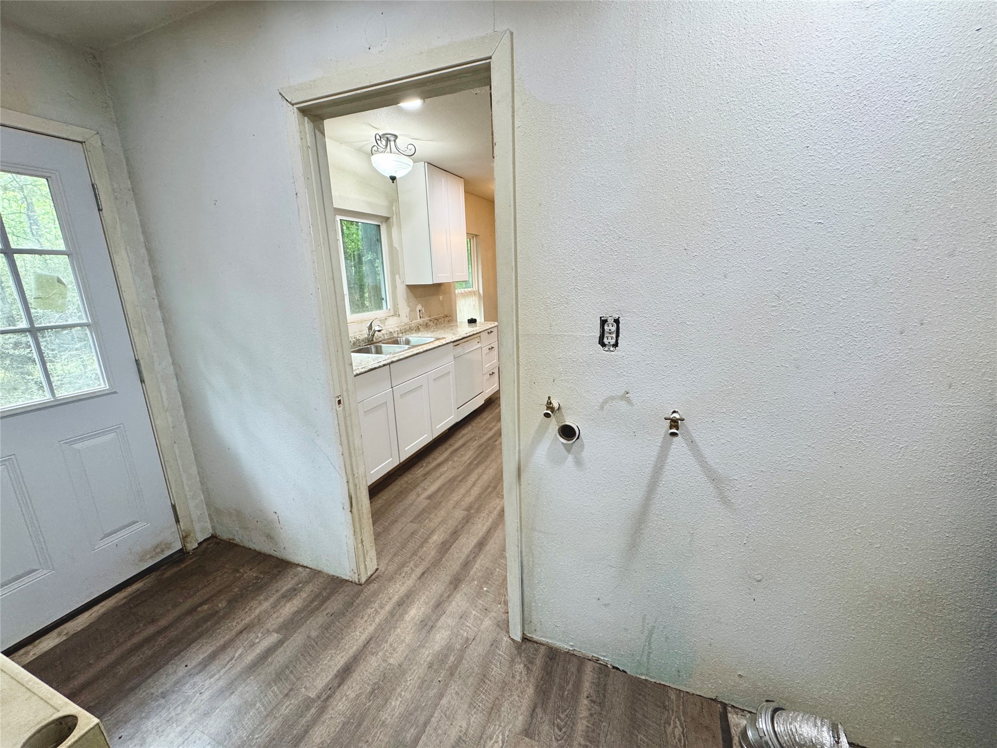 1380 Cardinal Lane Trinity, TX 75862 - Photo 13 of 28 Washer and dryer on this side. The other side could be a GREAT pantry!!