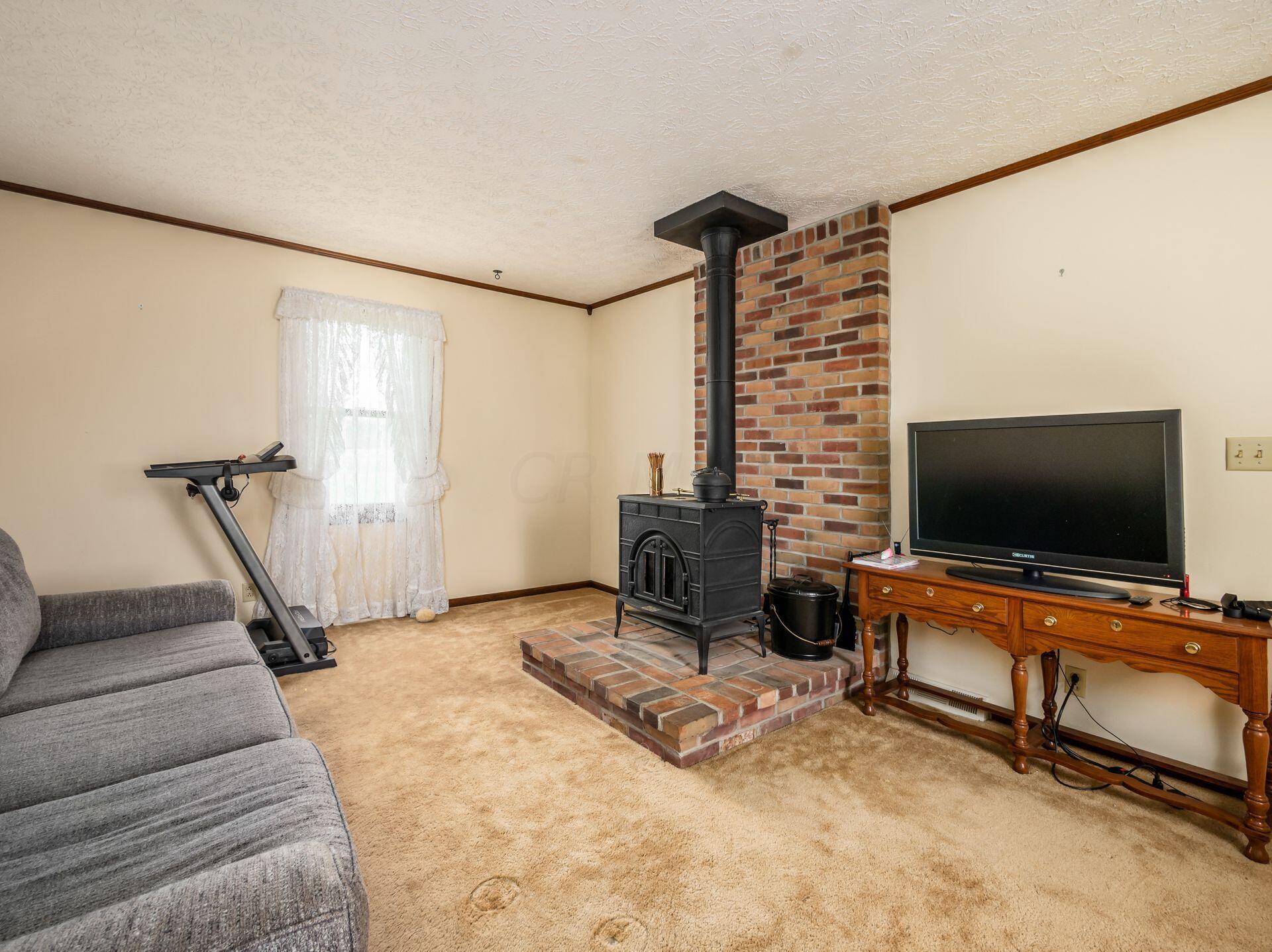 7575 Calhoun Road Ostrander, OH 43061 - Photo 8 of 57 Family Room