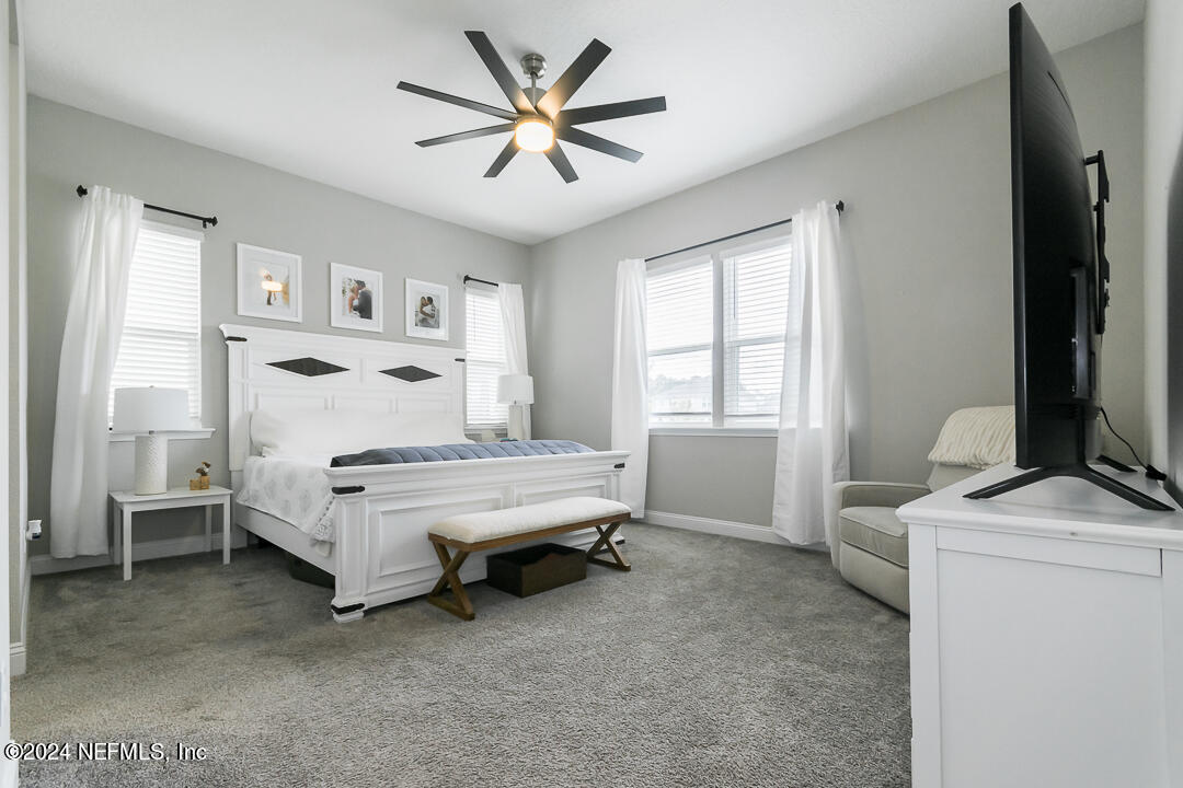 36 Leafmore Lane St. Augustine, FL 32092 - Photo 15 of 38 a bedroom with a bed and a window