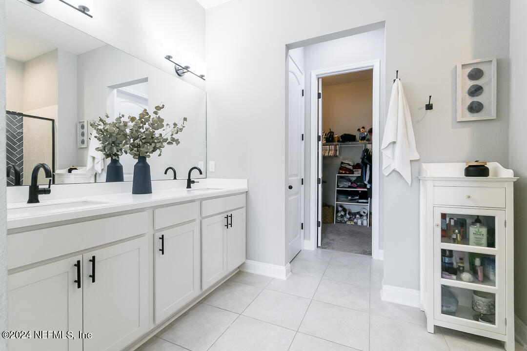 36 Leafmore Lane St. Augustine, FL 32092 - Photo 17 of 38 a bathroom with a sink and a mirror