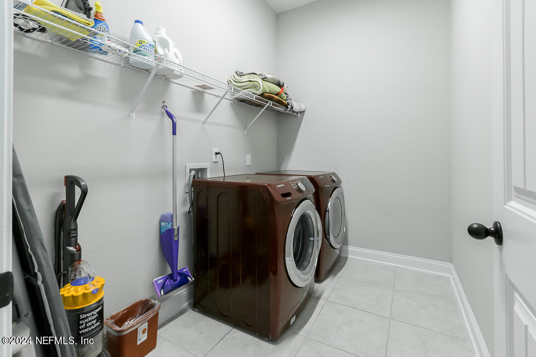 36 Leafmore Lane St. Augustine, FL 32092 - Photo 23 of 38 a utility room with dryer and washer