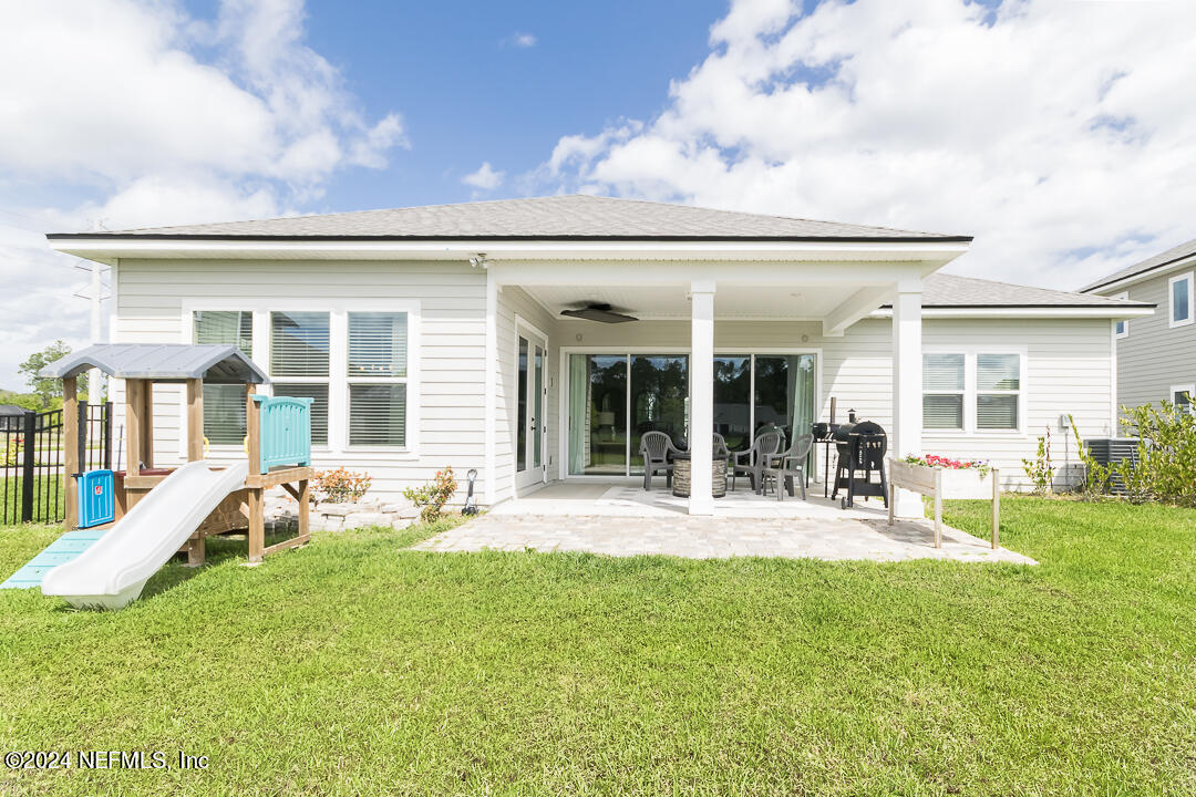 36 Leafmore Lane St. Augustine, FL 32092 - Photo 26 of 38 a house view with swimming pool and outdoor seating