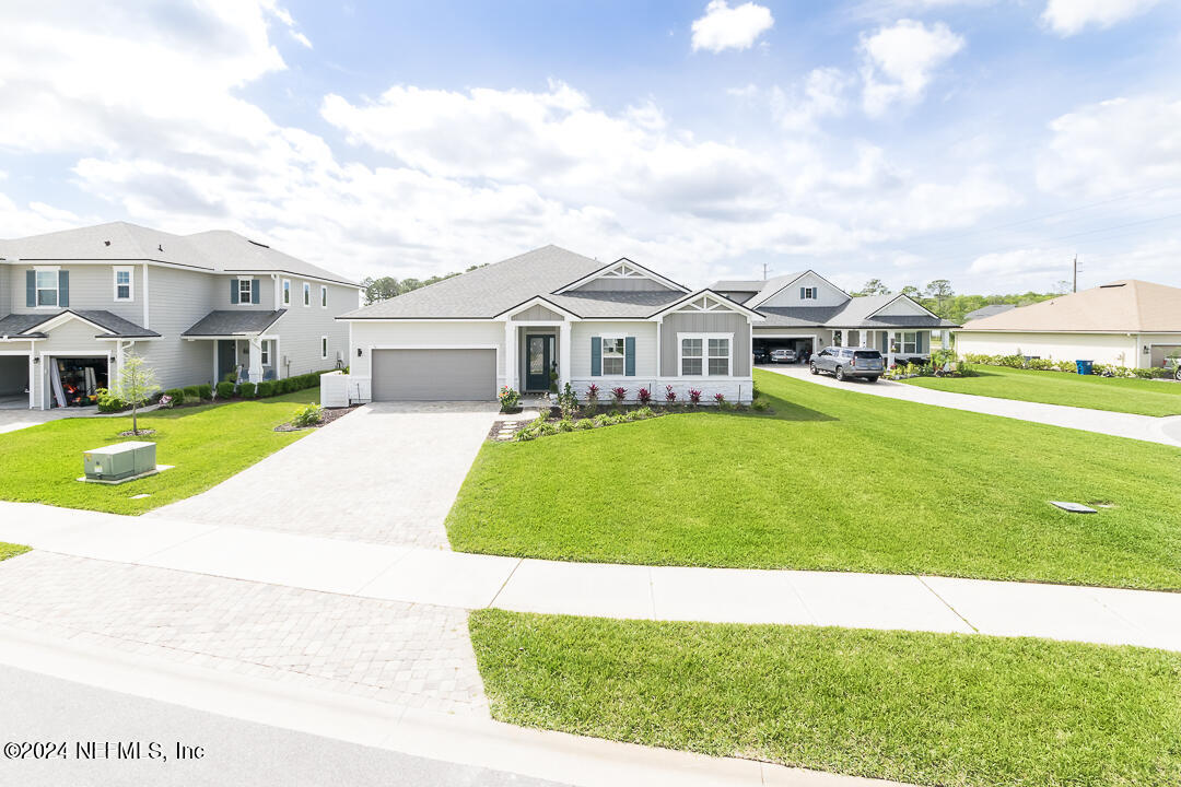 36 Leafmore Lane St. Augustine, FL 32092 - Photo 3 of 38 a view of house with a garden and trees
