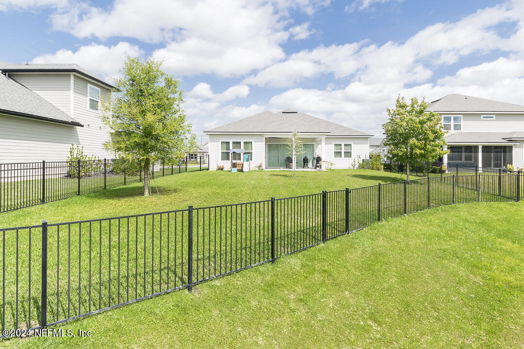 36 Leafmore Lane St. Augustine, FL 32092 - Photo 30 of 38 a view of an house with a backyard