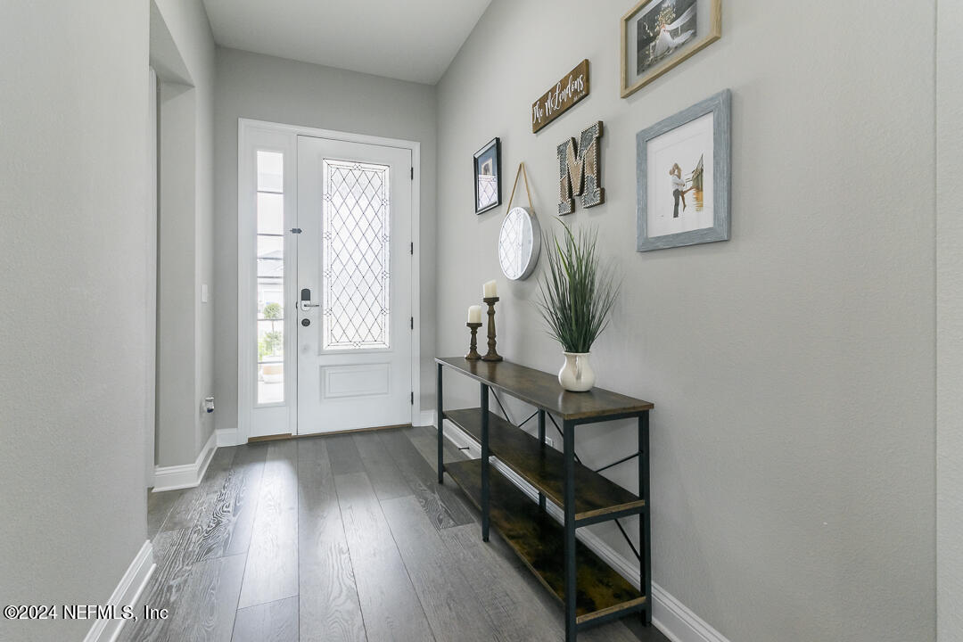36 Leafmore Lane St. Augustine, FL 32092 - Photo 4 of 38 a view of an entryway with wooden floor