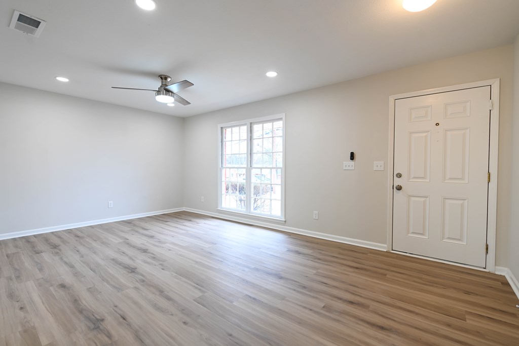 718 Wedron Drive Columbus, GA 31907 - Photo 12 of 38 a view of empty room with wooden floor and fan