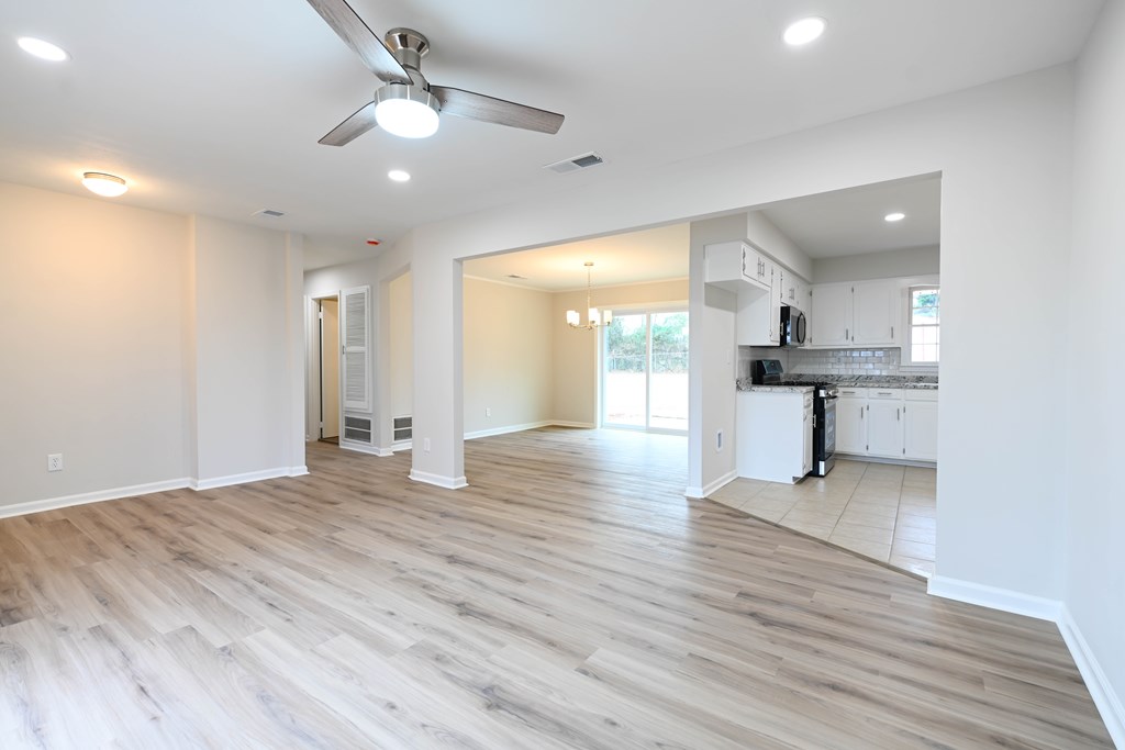 718 Wedron Drive Columbus, GA 31907 - Photo 15 of 38 a view of empty room with wooden floor and ceiling fan