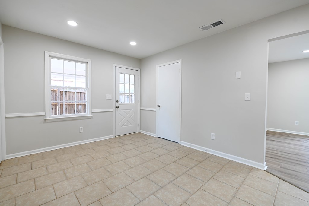 718 Wedron Drive Columbus, GA 31907 - Photo 22 of 38 wooden floor in an empty room with a window