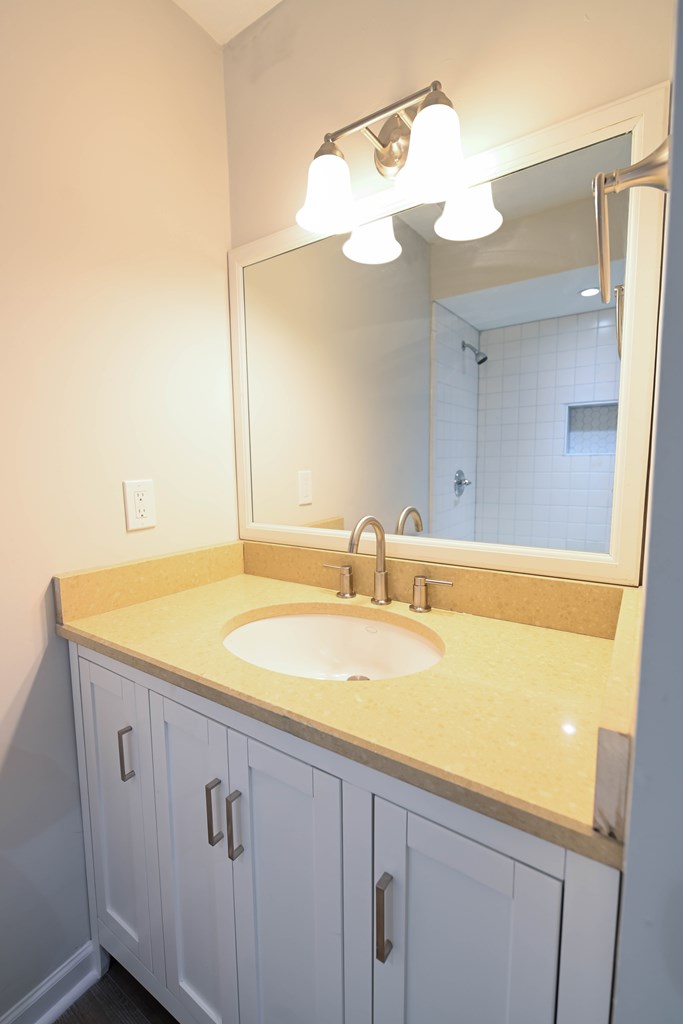 718 Wedron Drive Columbus, GA 31907 - Photo 30 of 38 a bathroom with a sink and a mirror
