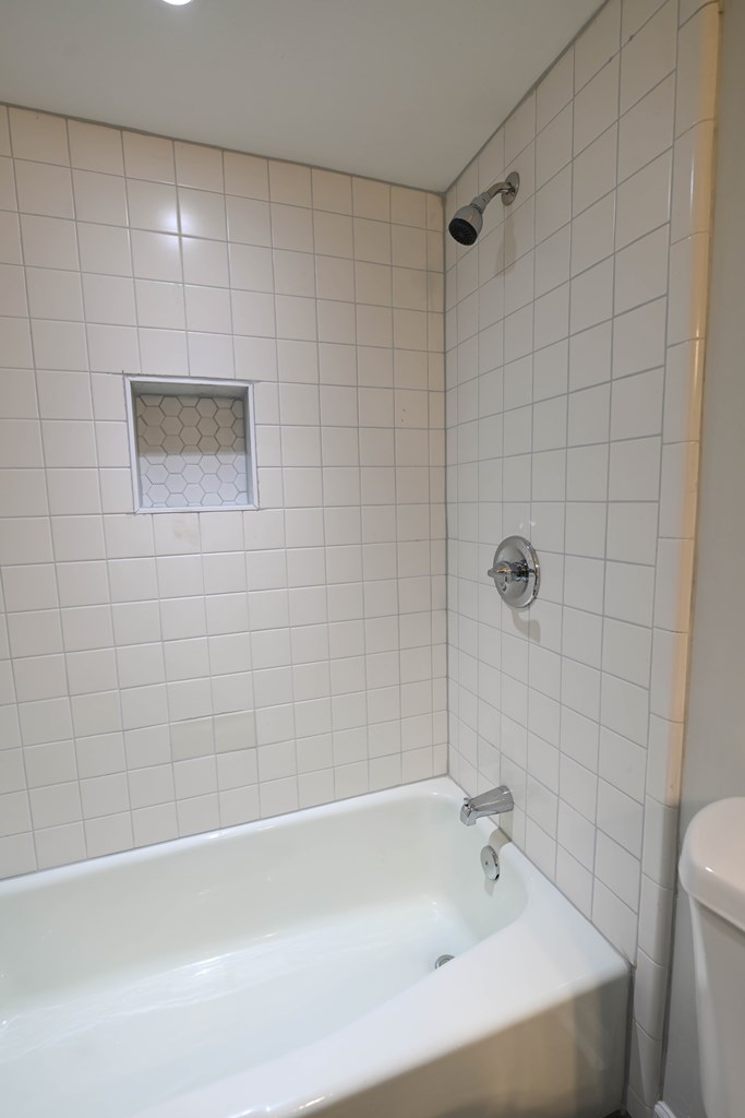 718 Wedron Drive Columbus, GA 31907 - Photo 31 of 38 a bathroom with a shower and a bathtub