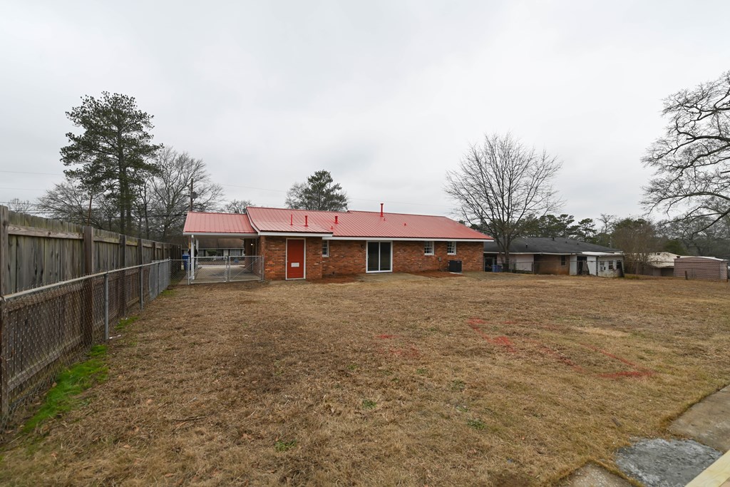 718 Wedron Drive Columbus, GA 31907 - Photo 9 of 38 a front view of a house with a yard