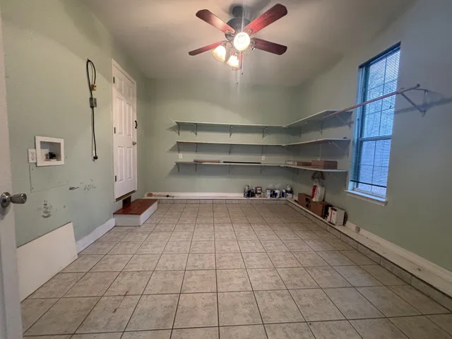 a room with storage and utility