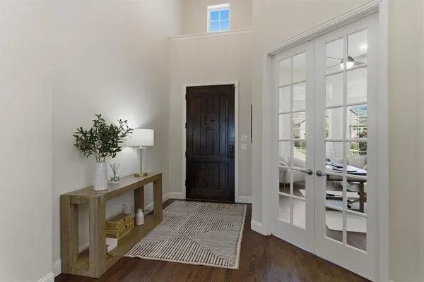 a view of entryway with wooden floor