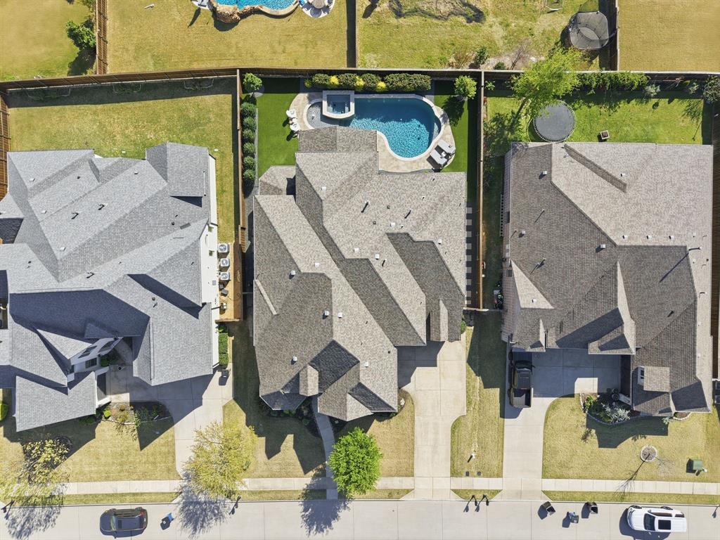 2801 Seabiscuit Road Celina, TX 75009 - Photo 37 of 39 an aerial view of a house with a swimming pool