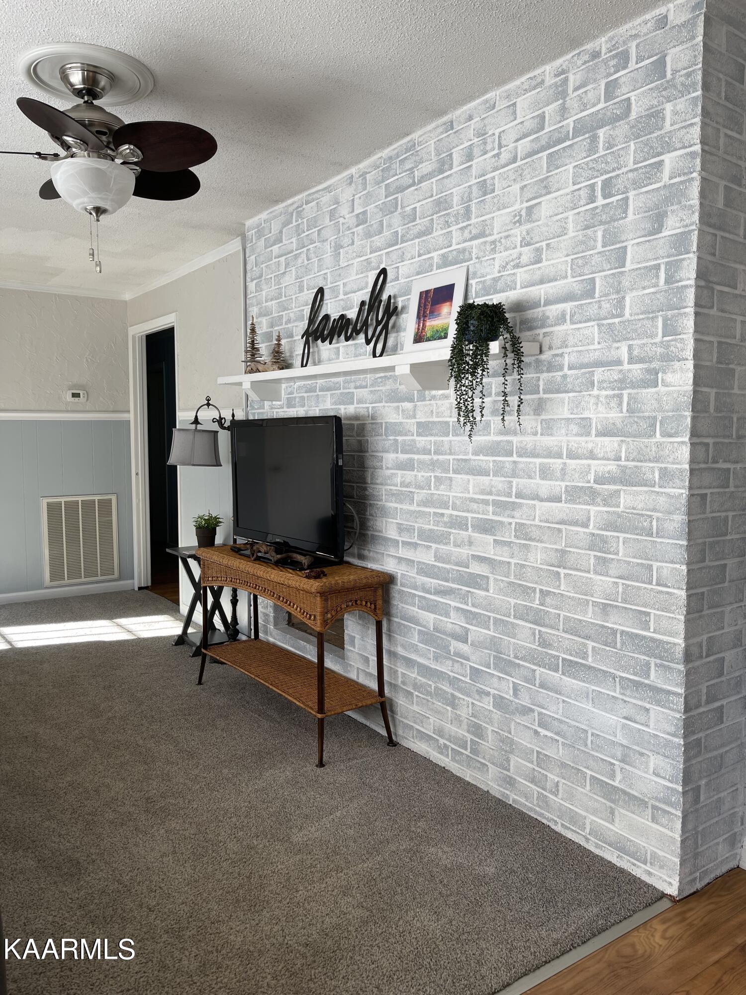 1301 Witt Hollow Road Sevierville, TN 37862 - Photo 6 of 39 Living Room Fireplace IMG_1747