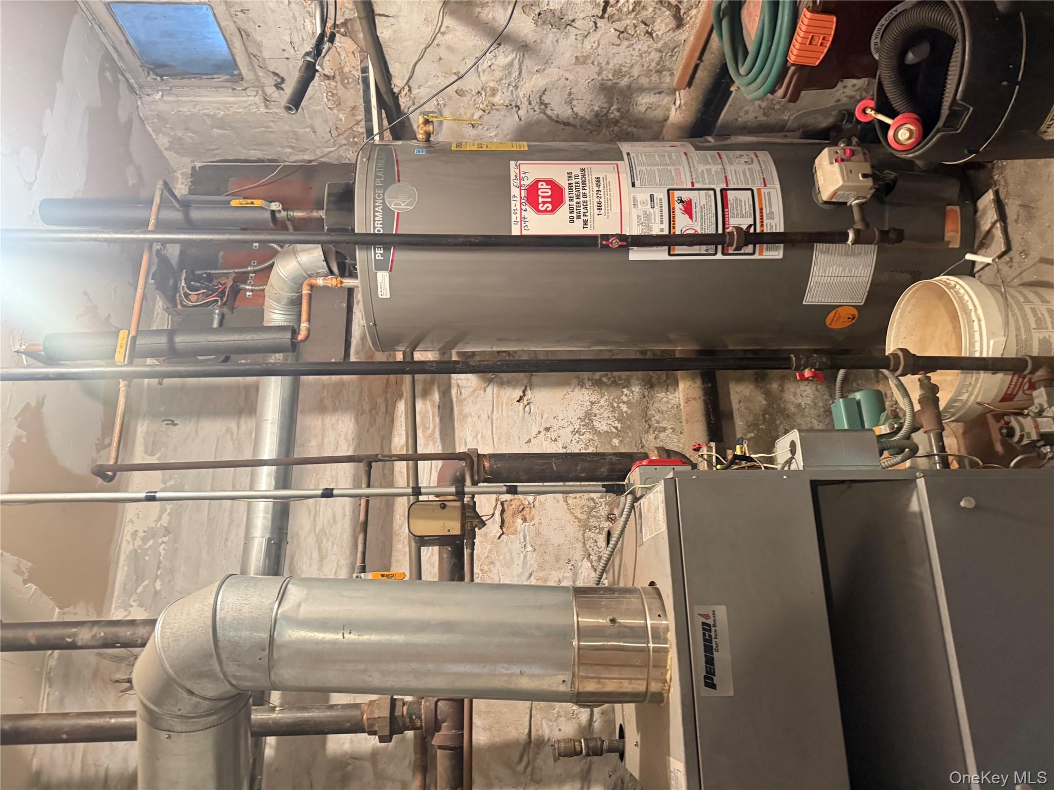 68-13 60th Street Queens, NY 11385 - Photo 26 of 27 a room with stainless steel appliances kitchen island granite countertop furniture and a shower