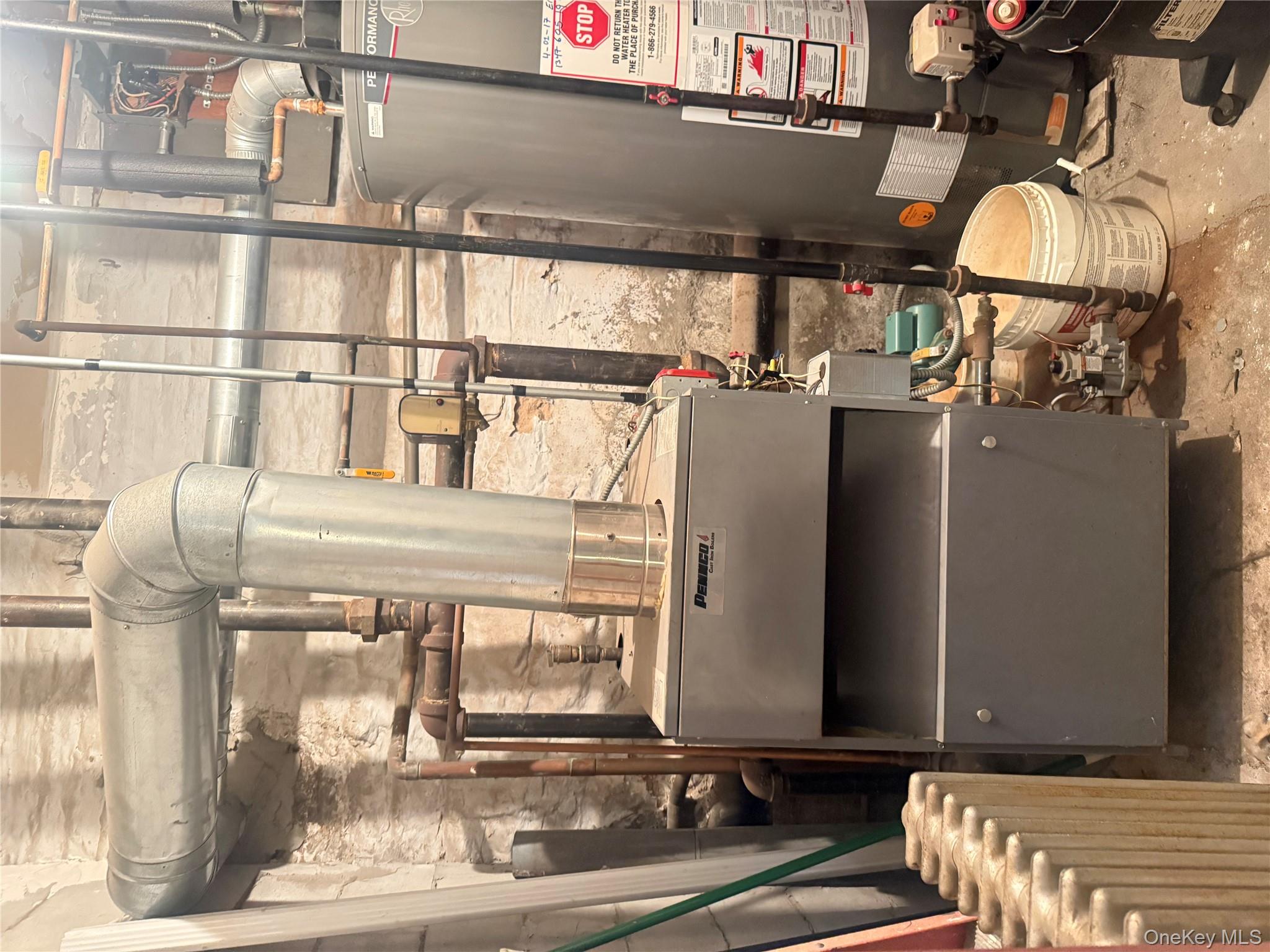 68-13 60th Street Queens, NY 11385 - Photo 27 of 27 a bathroom with a sink a toilet and a shower