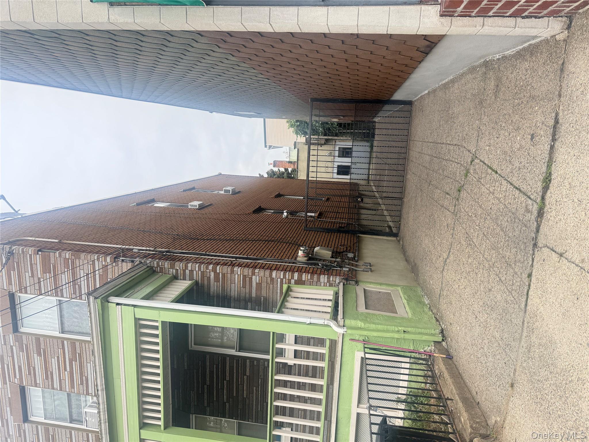 68-13 60th Street Queens, NY 11385 - Photo 3 of 27 a view of terrace with sitting area