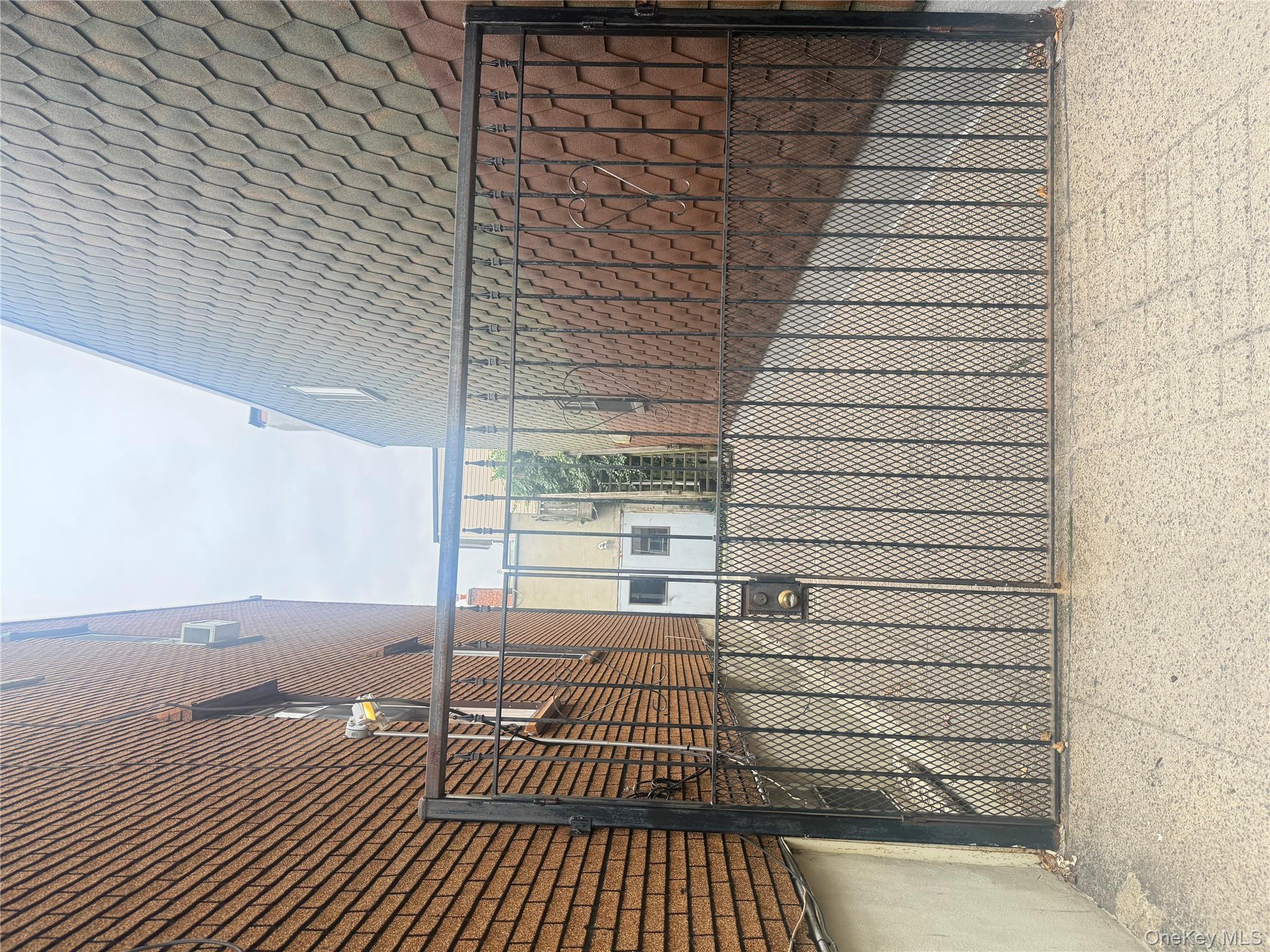 68-13 60th Street Queens, NY 11385 - Photo 4 of 27 a view of a entrance