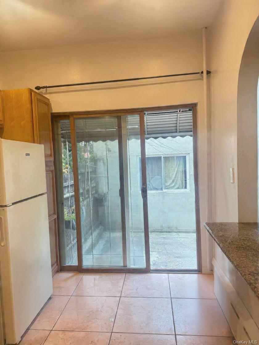 68-13 60th Street Queens, NY 11385 - Photo 10 of 27 a view of a entryway