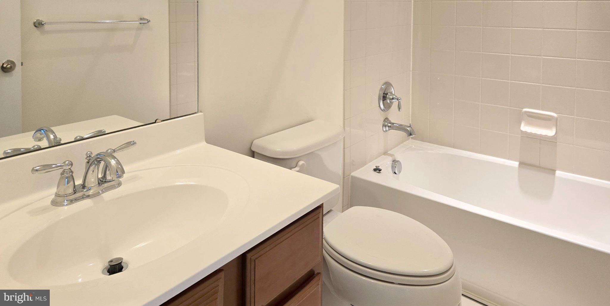 7339 Old Calvary Road Hanover, MD 21076 - Photo 13 of 22 Modern bathroom with sleek finishes.