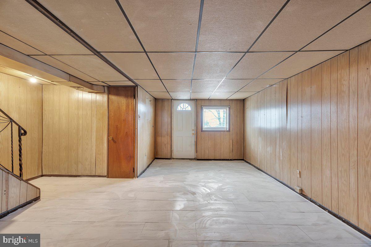 3639 Gaul Street Philadelphia, PA 19134 - Photo 19 of 23 a view of livingroom with an empty space and window