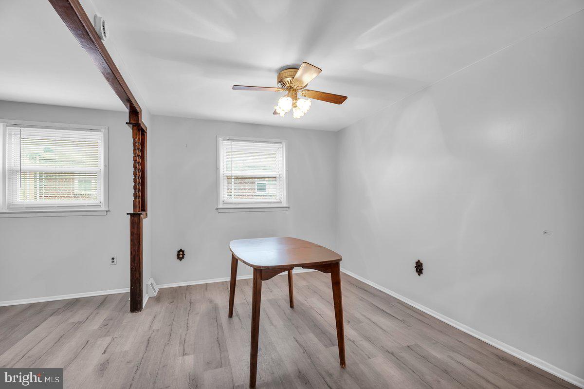 3639 Gaul Street Philadelphia, PA 19134 - Photo 7 of 23 a view of a room with a wooden floor and chandelier fan