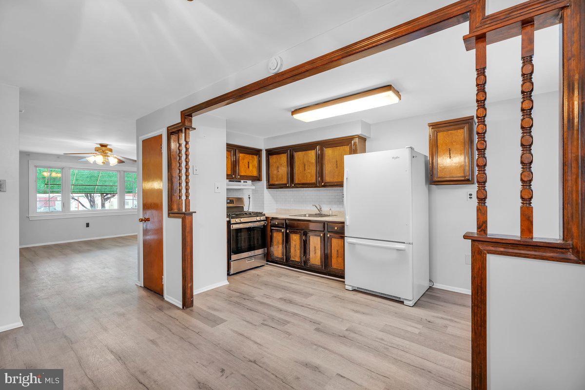 3639 Gaul Street Philadelphia, PA 19134 - Photo 9 of 23 a view of a kitchen with a refrigerator and a stove