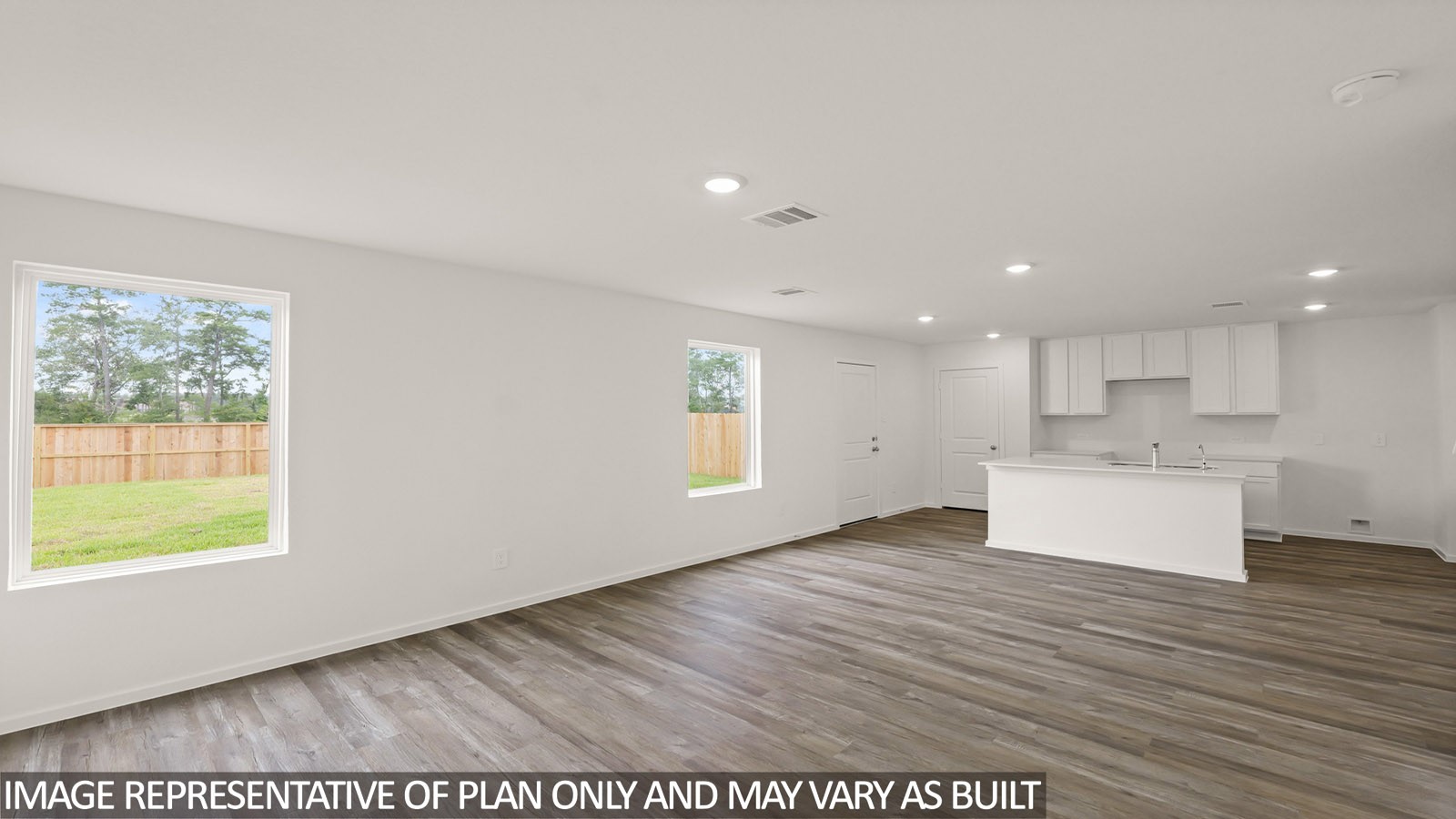 14357 Tawny Street Splendora, TX 77372 - Photo 5 of 24 an empty room with wooden floor and windows