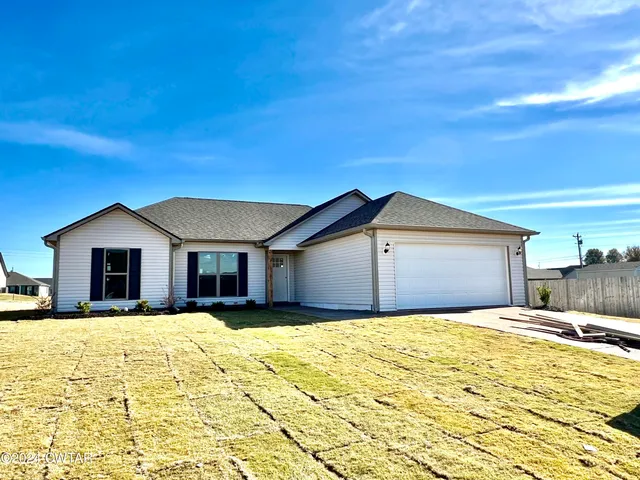 a house view with a outdoor space